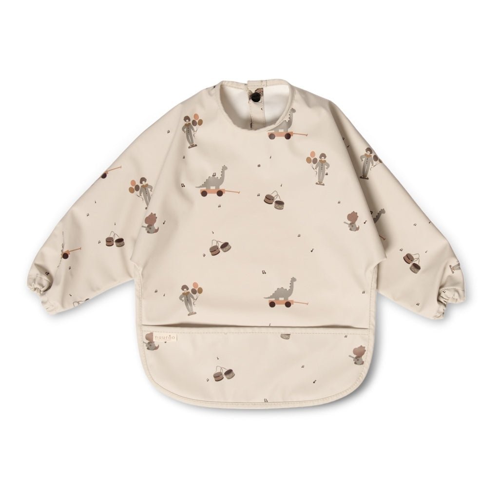 Vooraanzicht van het Nuuroo Luna slabbetje met lange mouwen en Muziek Dino print